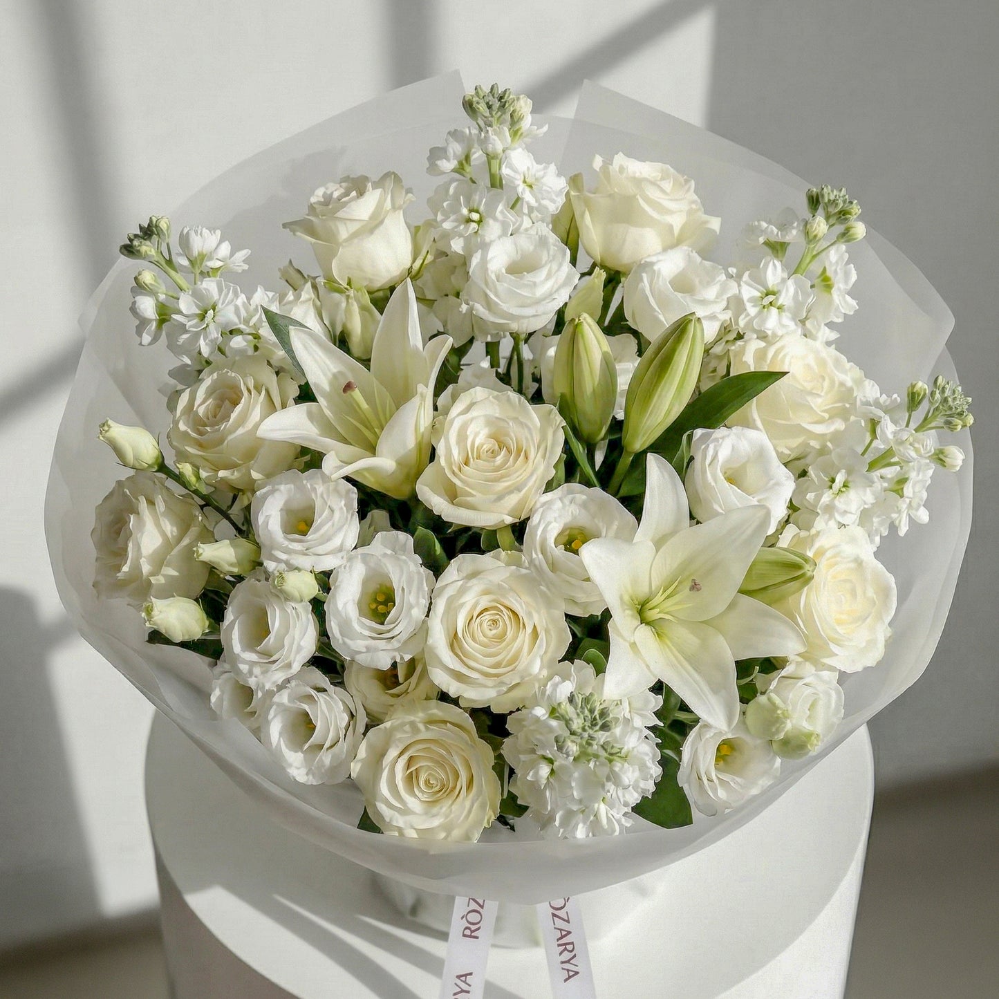 The Ivory Lily, Lisianthus, and Rose Serenity